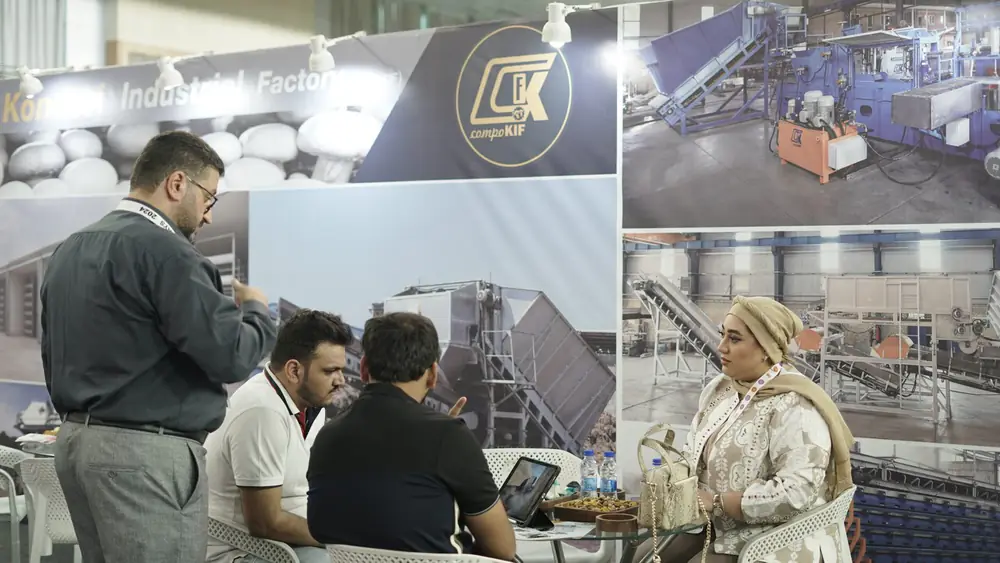 An industrial processing display at a machinery stand